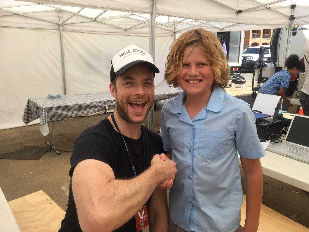 Hamish Blake with Lachlan on set for 'True Story'